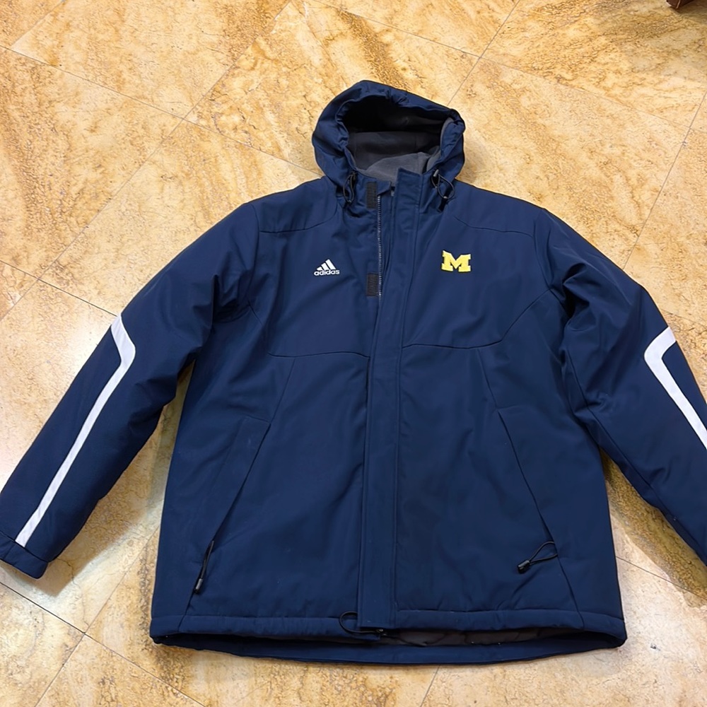 Adidas super warm up puffer with University of Michigan symbol
